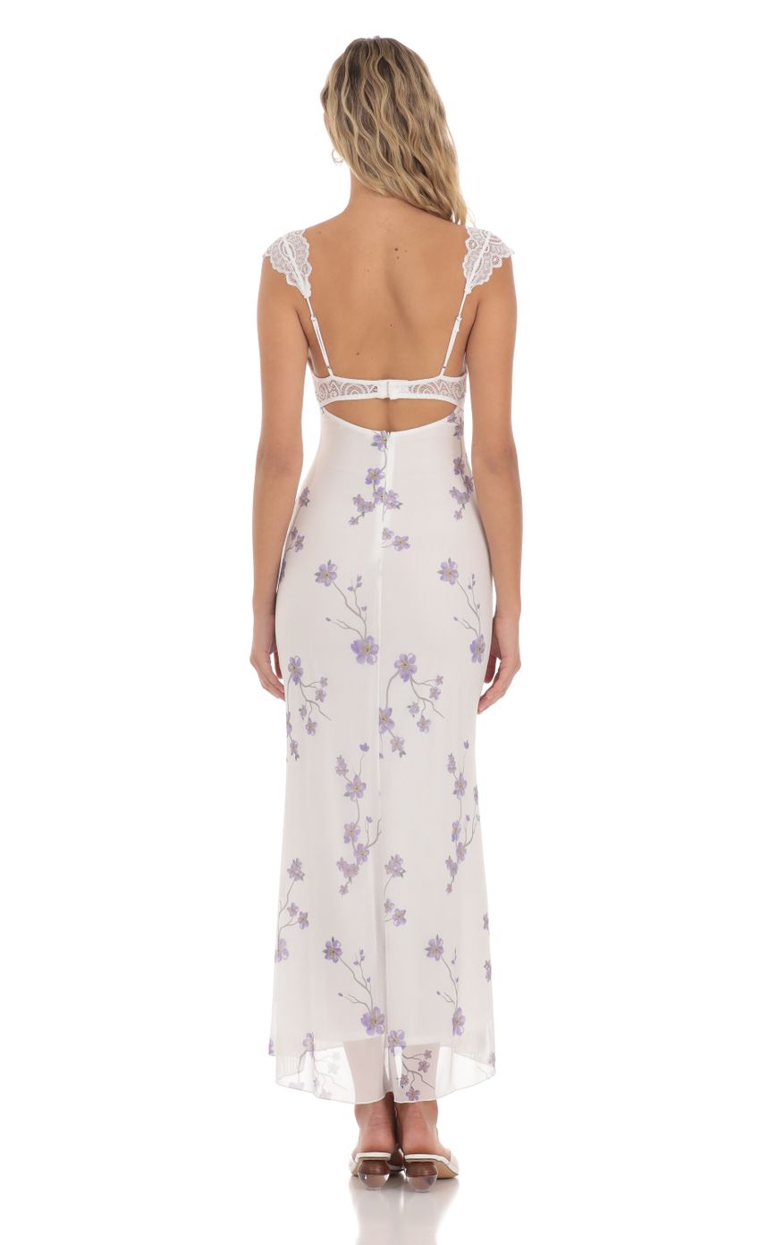 Picture Lace Cutout Floral Maxi Dress in White. Source: https://media-img.lucyinthesky.com/data/Apr24/850xAUTO/58cbf18d-8625-4550-b81f-61b8665aadf4.jpg