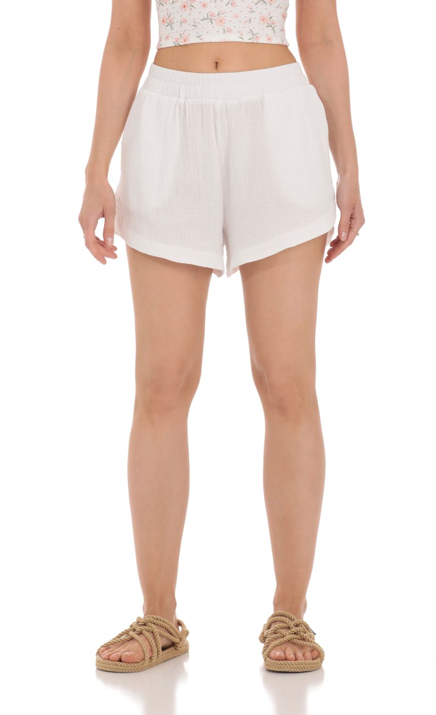 Picture Dolphin Shorts in White. Source: https://media-img.lucyinthesky.com/data/Apr24/850xAUTO/599744b0-0986-4fd3-a192-c3dcb33ca6b0.jpg