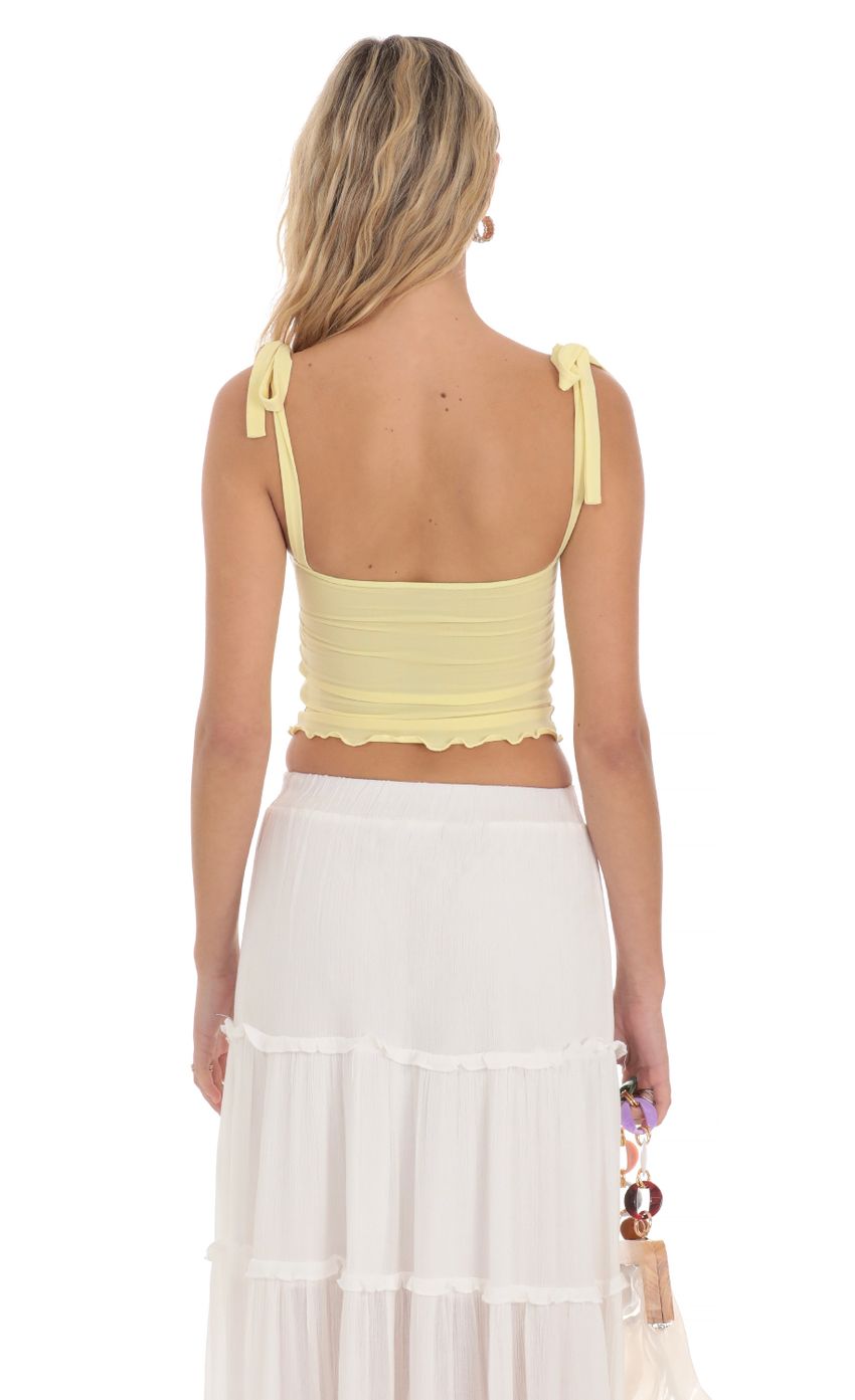 Picture Shoulder Ties Twist Top in Yellow. Source: https://media-img.lucyinthesky.com/data/Apr24/850xAUTO/6237045c-230c-42da-9563-d48abbe7621a.jpg