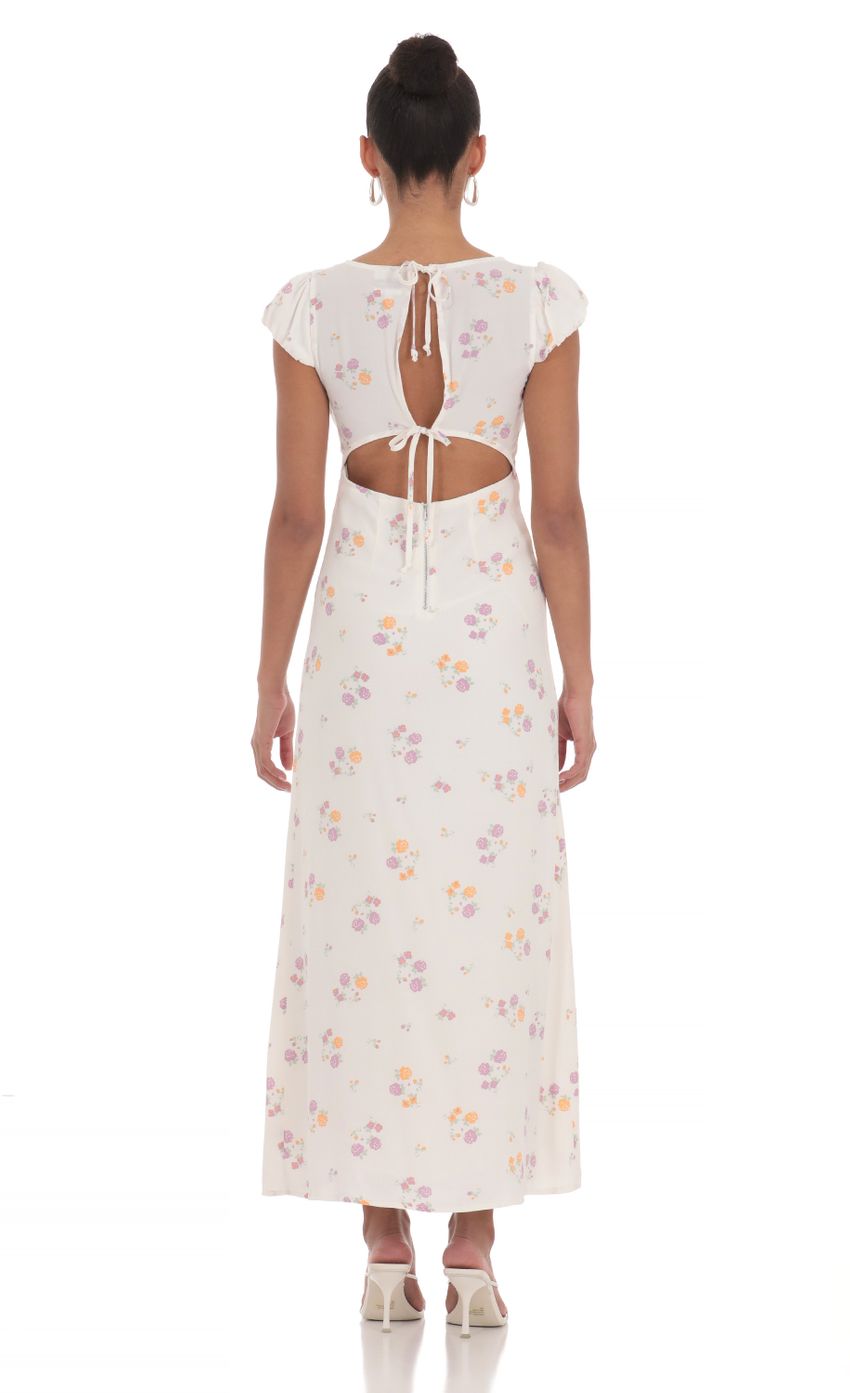Picture Puff Sleeve Floral Maxi Dress in White. Source: https://media-img.lucyinthesky.com/data/Apr24/850xAUTO/7243acfe-67aa-4529-aaa0-5cb3321f55b7.jpg