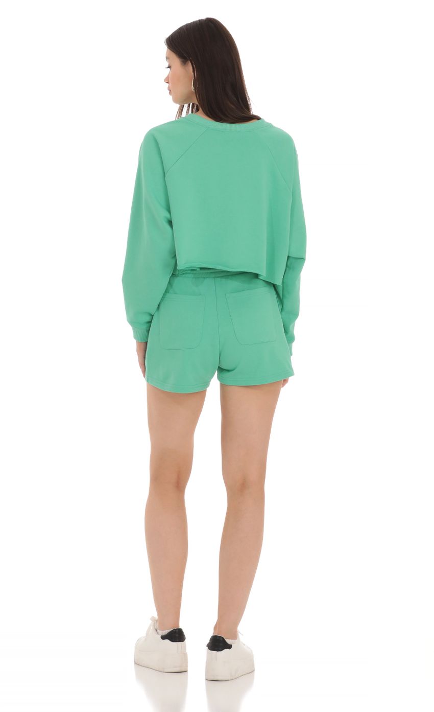 Picture Sweat Shorts in Lime Green. Source: https://media-img.lucyinthesky.com/data/Apr24/850xAUTO/78b8f996-4d3c-4887-8ff5-dcd5236438e5.jpg