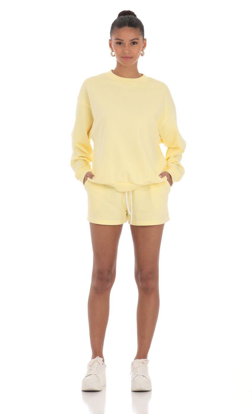 Picture Sweat Shorts in Yellow. Source: https://media-img.lucyinthesky.com/data/Apr24/850xAUTO/7c300f27-4767-4298-9a64-cdc547c299af.jpg