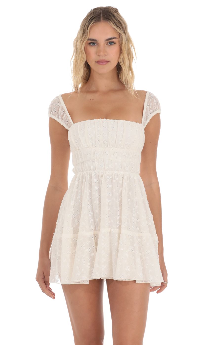 Picture Chiffon Eyelet Cap Sleeve Dress in Cream. Source: https://media-img.lucyinthesky.com/data/Apr24/850xAUTO/7cc5a580-05d0-4a27-ad7c-b7eaf4d07910.jpg
