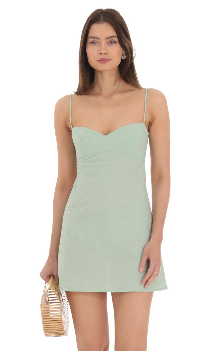 Picture Dotted Sweetheart Neck Babydoll Dress in Sage. Source: https://media-img.lucyinthesky.com/data/Apr24/850xAUTO/7d08f5e7-0326-49f0-b6f4-2d02c5f9348c.jpg