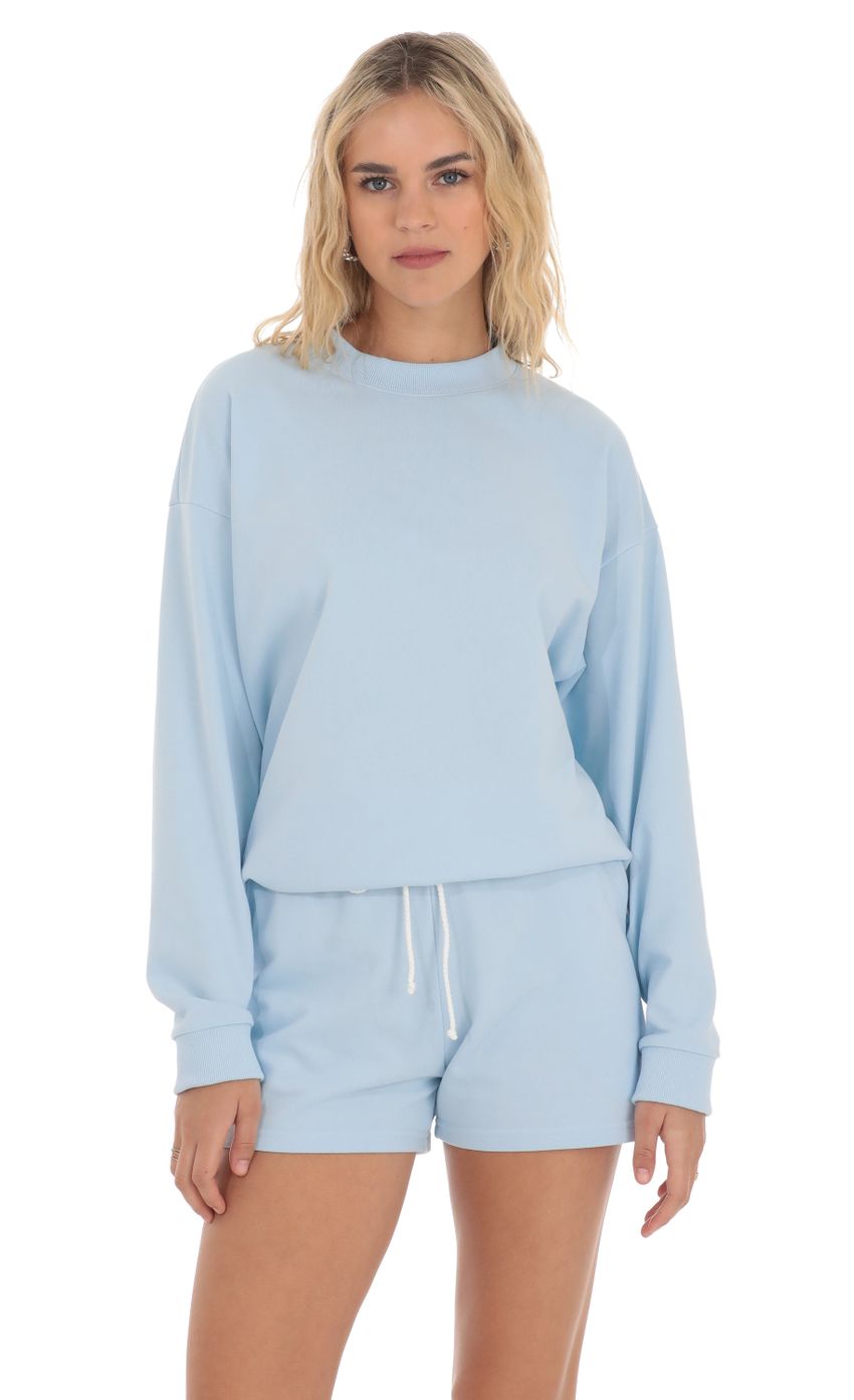 Picture Oversized Jumper in Baby Blue. Source: https://media-img.lucyinthesky.com/data/Apr24/850xAUTO/86da19fc-c163-4f34-b764-632e2467fb6a.jpg