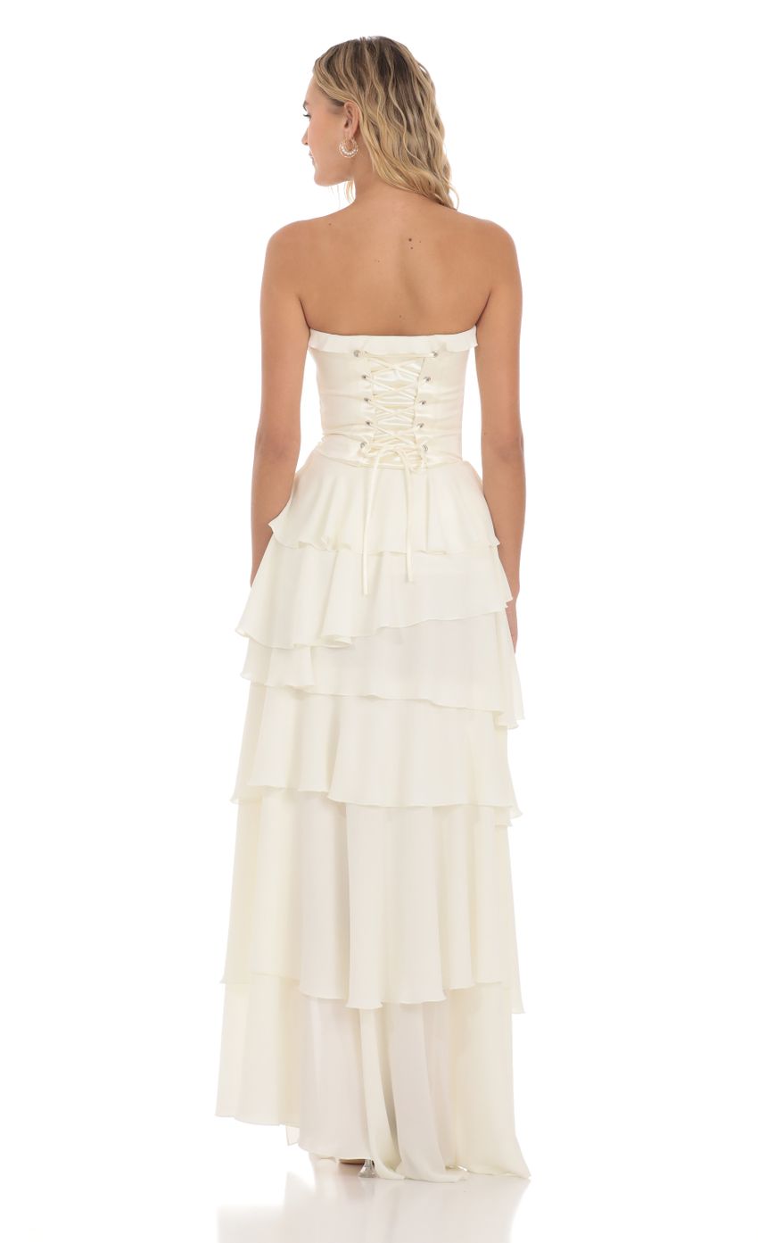 Picture Corset Ruffle Strapless Maxi Dress in Cream. Source: https://media-img.lucyinthesky.com/data/Apr24/850xAUTO/92f770b1-2880-4f2e-b3b7-fd3b2e6dc59c.jpg