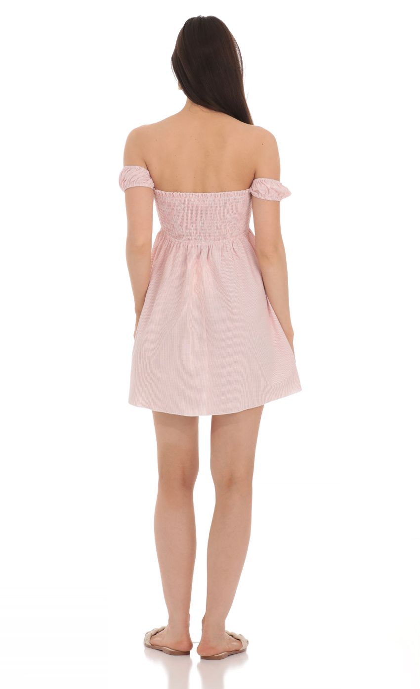 Picture Striped Smocked Off Shoulder Dress in Pink. Source: https://media-img.lucyinthesky.com/data/Apr24/850xAUTO/93dd1a80-4cd7-47f1-a462-58a333412748.jpg