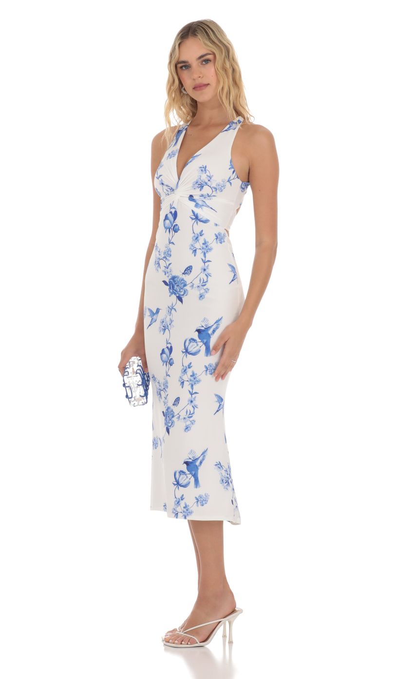 Picture Floral Front Twist Midi Dress in White. Source: https://media-img.lucyinthesky.com/data/Apr24/850xAUTO/9417704b-3336-43b1-a87b-d365dd314cf2.jpg