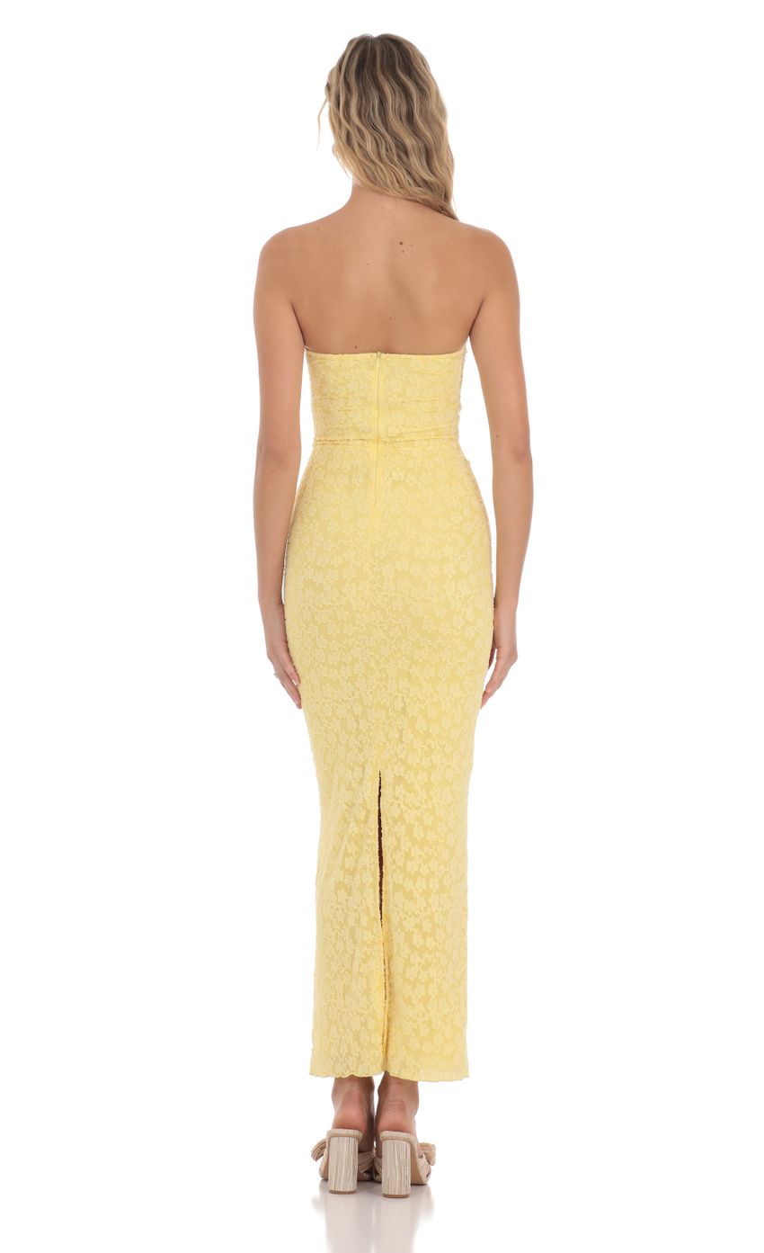 Picture Strapless Textured Floral Twist Maxi Dress in Yellow. Source: https://media-img.lucyinthesky.com/data/Apr24/850xAUTO/95bdc613-ea3b-426d-8df8-75f9be2bc012.jpg