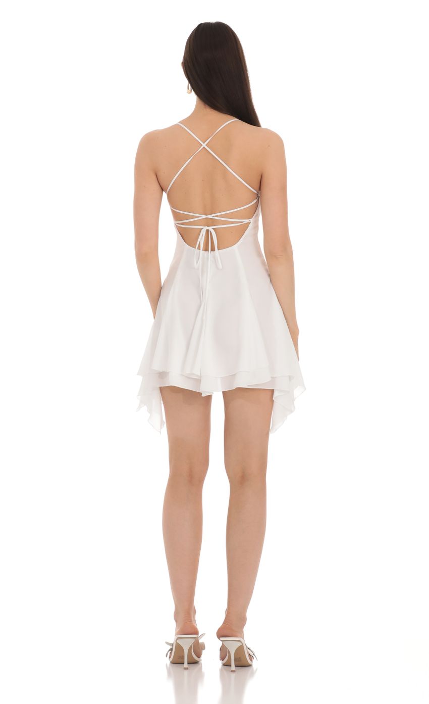 Picture Asymmetrical Side Flare Dress in White. Source: https://media-img.lucyinthesky.com/data/Apr24/850xAUTO/96282dd1-d291-49ed-bf28-515138039027.jpg
