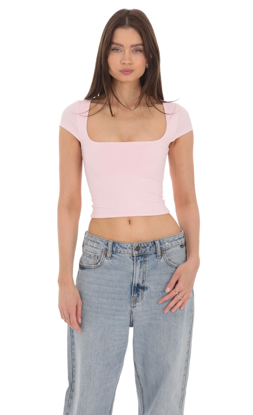 Picture Short Sleeve Crop Top in Baby Pink. Source: https://media-img.lucyinthesky.com/data/Apr24/850xAUTO/981c3d4a-be1e-41d3-aa44-aefbdef51182.jpg
