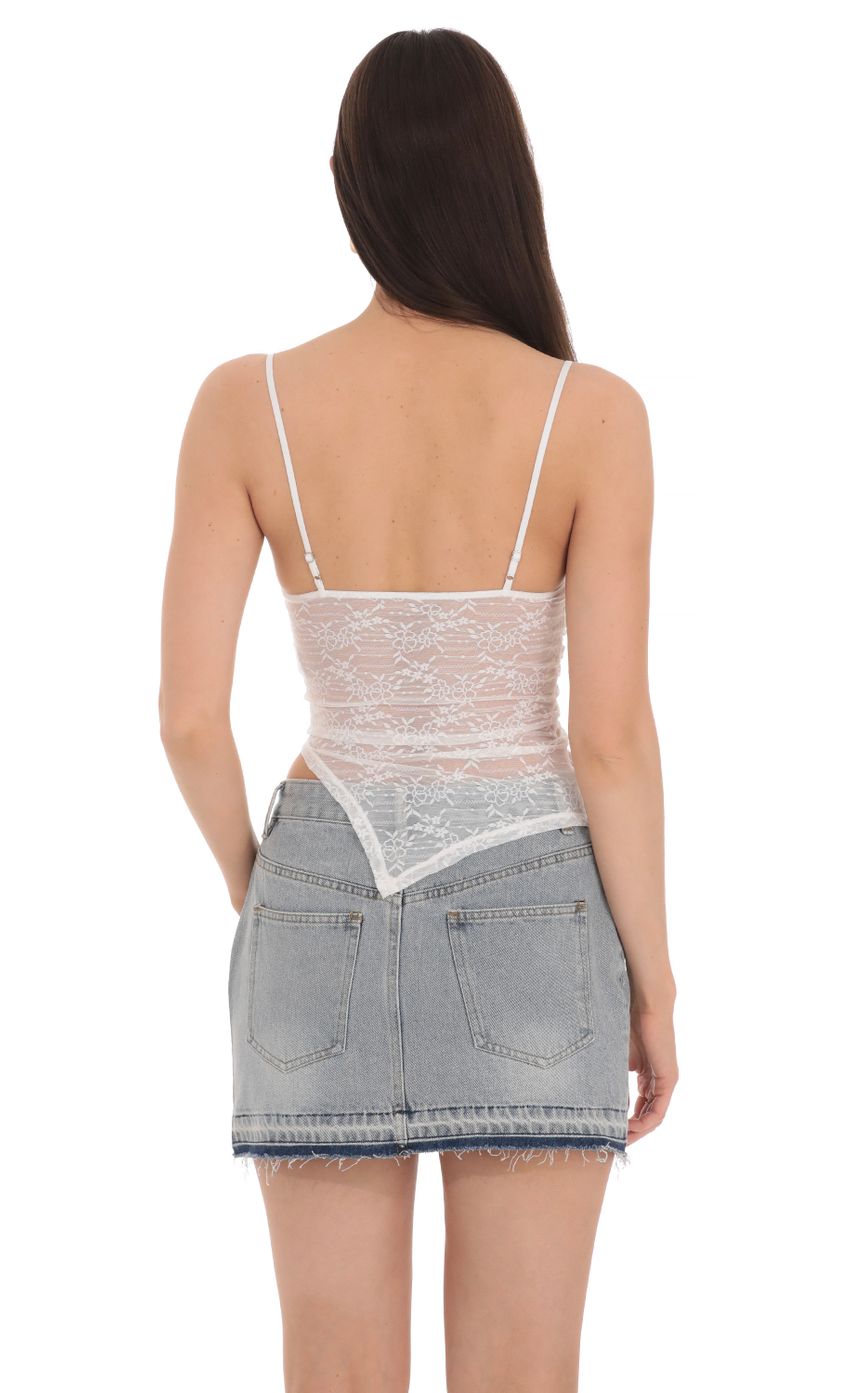 Picture Sheer Lace Asymmetrical Top in White. Source: https://media-img.lucyinthesky.com/data/Apr24/850xAUTO/9c7f567d-8a2d-4867-b610-5bf7d23ad550.jpg