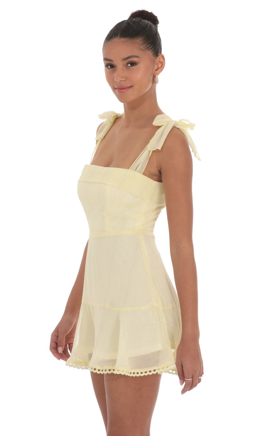 Picture Shimmer Striped A-line Dress in Yellow. Source: https://media-img.lucyinthesky.com/data/Apr24/850xAUTO/9dd0960d-2a51-4dc9-8dc4-52d28cc9323b.jpg