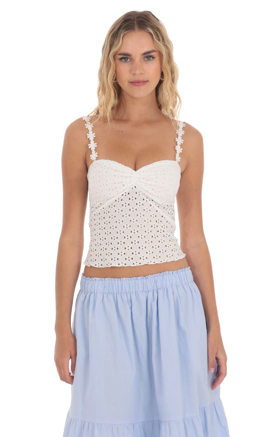Picture Floral Strap Eyelet Top in White. Source: https://media-img.lucyinthesky.com/data/Apr24/850xAUTO/a235bb00-3c85-4933-a3b6-d8b19ceb24a0.jpg