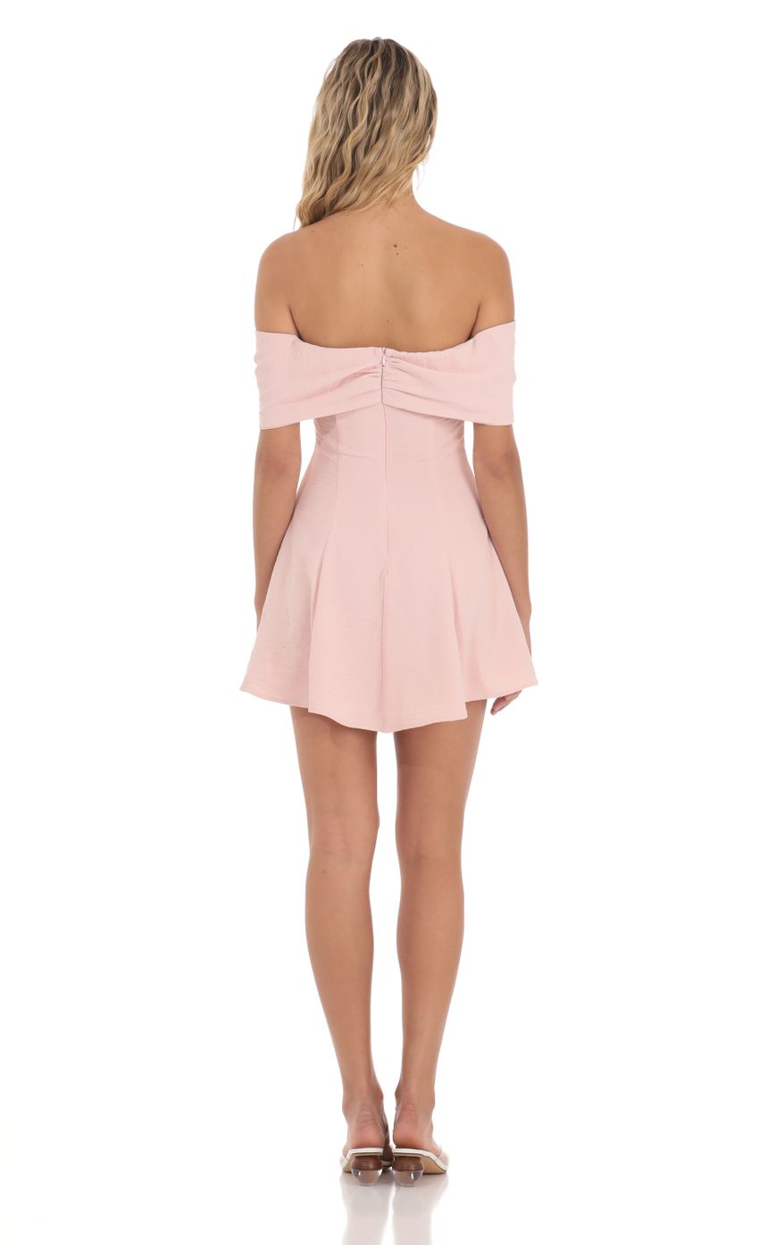 Picture Front Bow Off Shoulder Dress in Pink. Source: https://media-img.lucyinthesky.com/data/Apr24/850xAUTO/a5002ecb-774b-40a2-b214-8a3722bbecfb.jpg