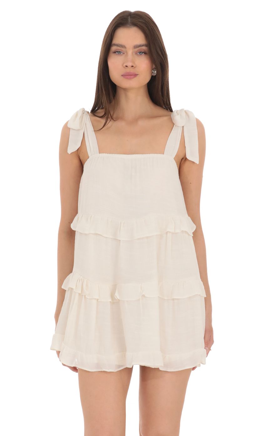 Picture Ruffle Shift Dress in Cream. Source: https://media-img.lucyinthesky.com/data/Apr24/850xAUTO/a798f0b8-4582-4637-be7a-d75555c22e5c.jpg