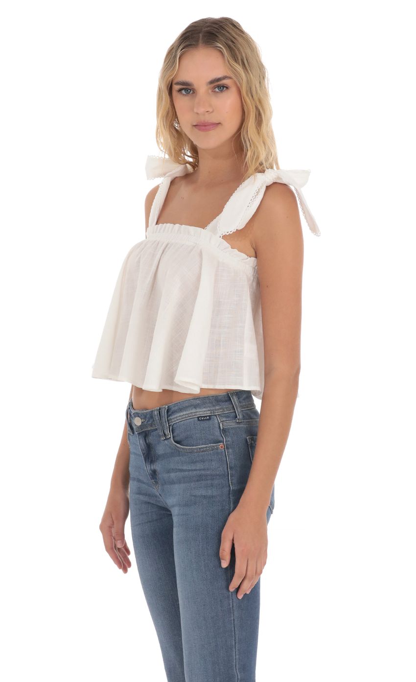Picture Shoulder Tie Top in White. Source: https://media-img.lucyinthesky.com/data/Apr24/850xAUTO/ac81fdf6-fa47-4041-b3f1-865c3c68e1d2.jpg