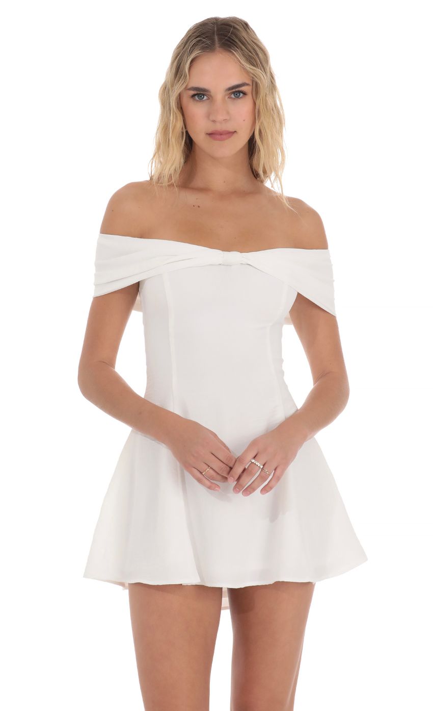 Picture Front Bow Off Shoulder Dress in White. Source: https://media-img.lucyinthesky.com/data/Apr24/850xAUTO/ae1d5947-012c-4b93-9ab6-194e3a3459d7.jpg