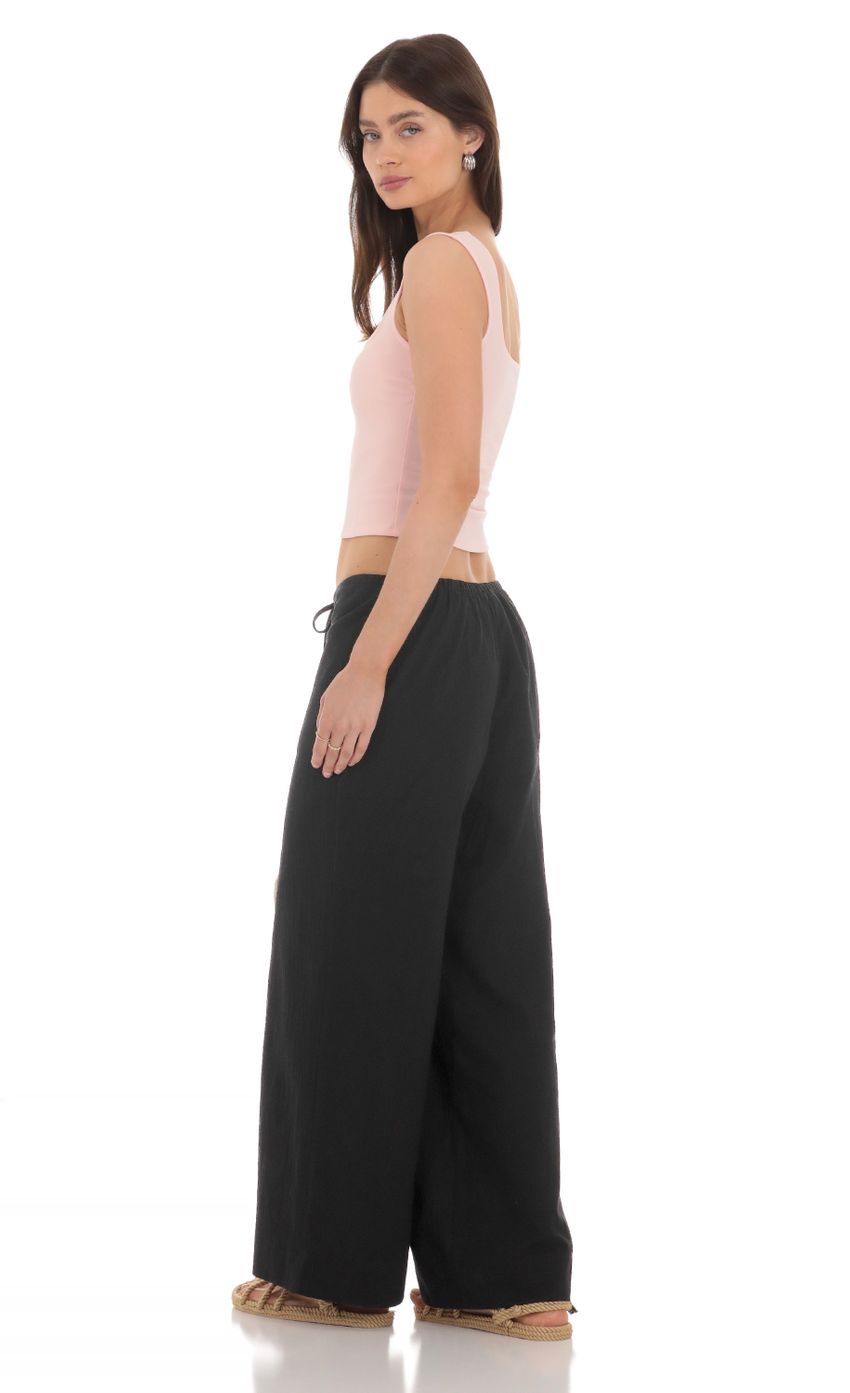 Picture Low Rise Straight Pants in Black. Source: https://media-img.lucyinthesky.com/data/Apr24/850xAUTO/ae6df9ff-a514-4d7a-87f4-3dd719b5e5fe.jpg