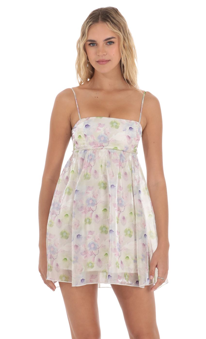 Picture Floral Babydoll Dress in White. Source: https://media-img.lucyinthesky.com/data/Apr24/850xAUTO/b2832e19-1aea-42ce-9115-4d354d2cb406.jpg