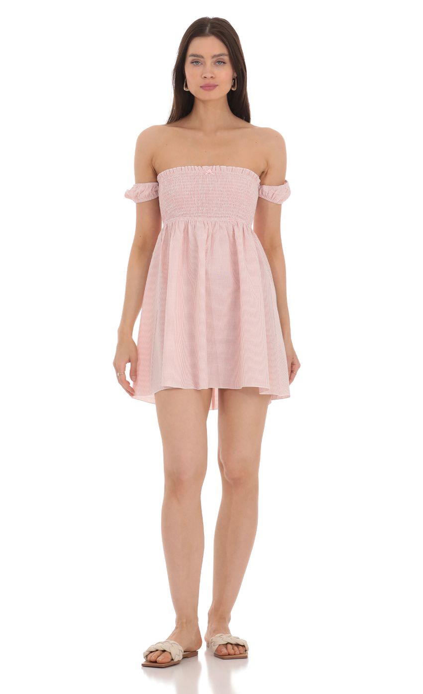 Picture Striped Smocked Off Shoulder Dress in Pink. Source: https://media-img.lucyinthesky.com/data/Apr24/850xAUTO/b2ad90b3-78a7-4e43-8045-93c50e5d00c0.jpg