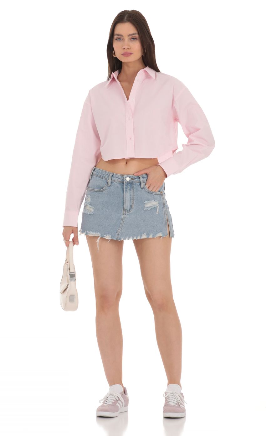Picture Cropped Button Down Shirt in Pink. Source: https://media-img.lucyinthesky.com/data/Apr24/850xAUTO/b2ba3d40-7d5c-4fb4-b544-f1b05f37f393.jpg