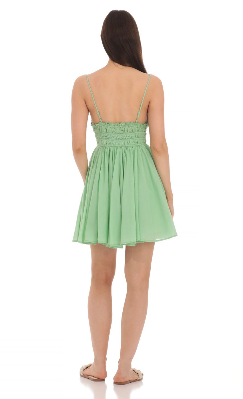 Picture Lace Trim V-Neck Dress in Green. Source: https://media-img.lucyinthesky.com/data/Apr24/850xAUTO/b48061a1-af13-4a6d-b052-3f9debaf587c.jpg