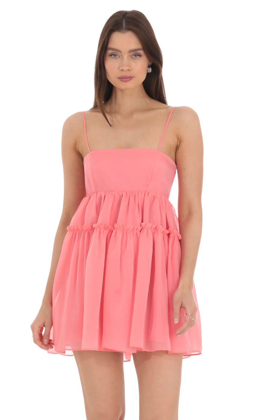 Picture Chiffon Babydoll Dress in Coral. Source: https://media-img.lucyinthesky.com/data/Apr24/850xAUTO/b73257c0-e6ff-4f6e-b0a1-628cfb5be908.jpg