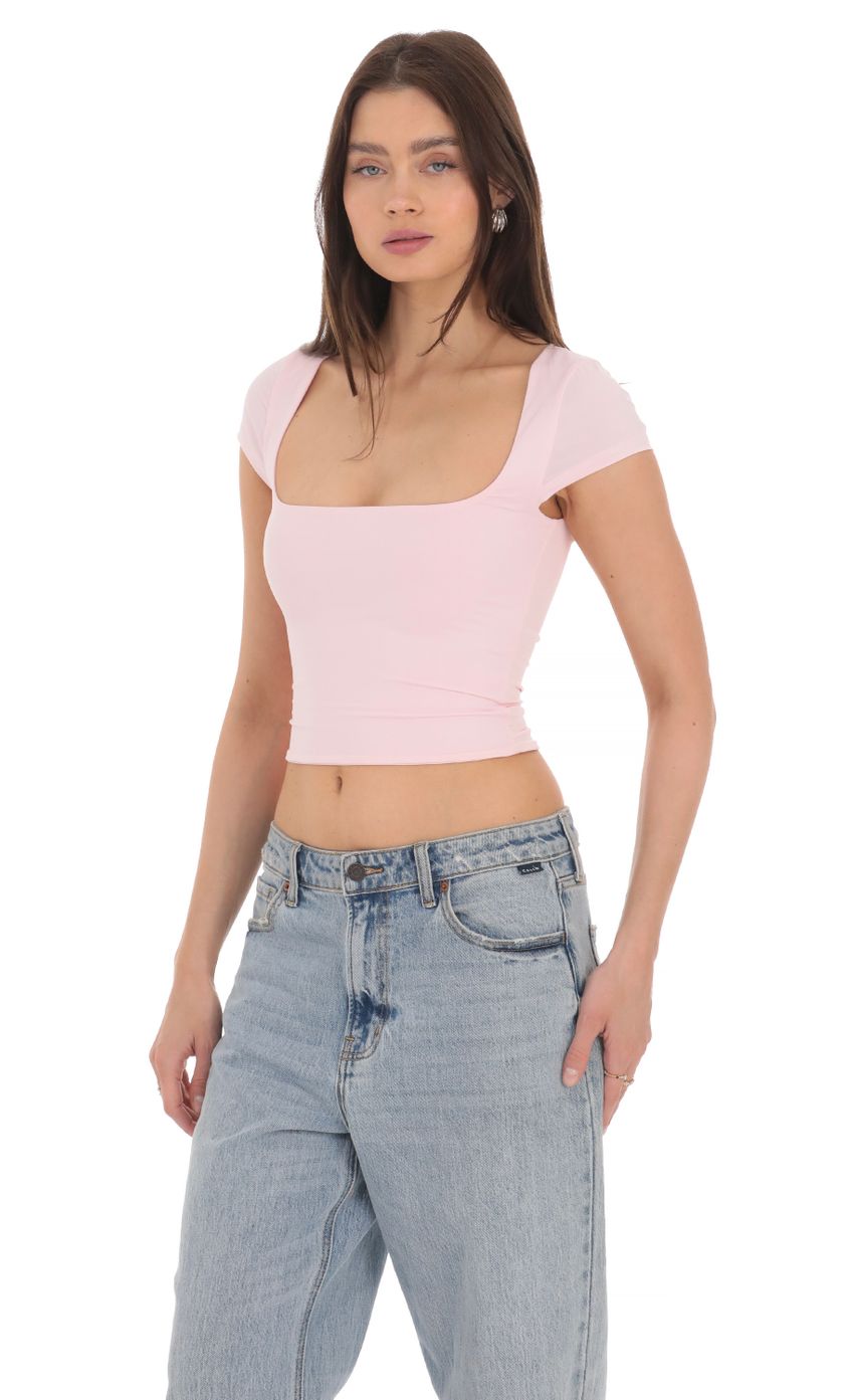 Picture Short Sleeve Crop Top in Baby Pink. Source: https://media-img.lucyinthesky.com/data/Apr24/850xAUTO/bca7704a-71b0-4746-a392-c8bc701a7332.jpg