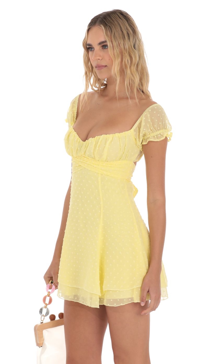 Picture Dotted Puff Sleeve Dress in Yellow. Source: https://media-img.lucyinthesky.com/data/Apr24/850xAUTO/bce8b942-ec15-449c-8694-eeb5e5eb0f3e.jpg