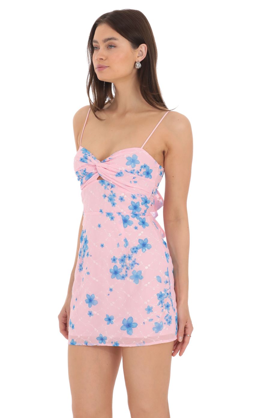 Picture Floral Front Twist Dress in Pink. Source: https://media-img.lucyinthesky.com/data/Apr24/850xAUTO/bdcfc17a-2631-4c9a-8ce0-0f8118823b6a.jpg