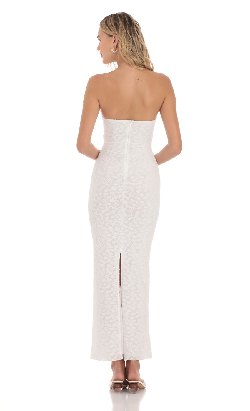Picture Strapless Textured Floral Twist Maxi Dress in White. Source: https://media-img.lucyinthesky.com/data/Apr24/850xAUTO/be0fcbd7-efc5-4a89-9d58-3586d966a563.jpg