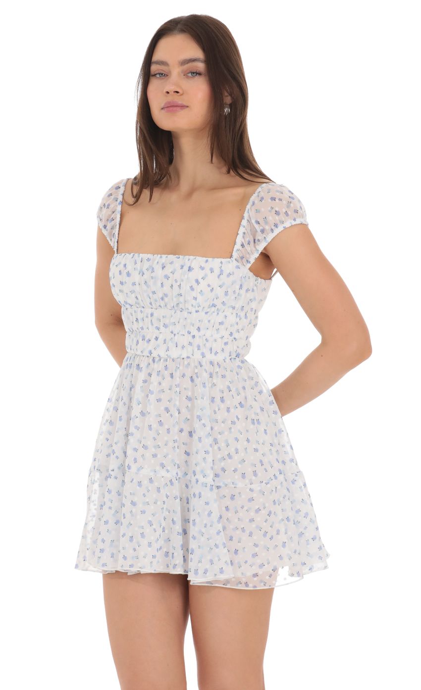Picture Chiffon Floral Cap Sleeve Dress in White. Source: https://media-img.lucyinthesky.com/data/Apr24/850xAUTO/c7bc4f43-0c85-4146-a410-54303ed7f51b.jpg