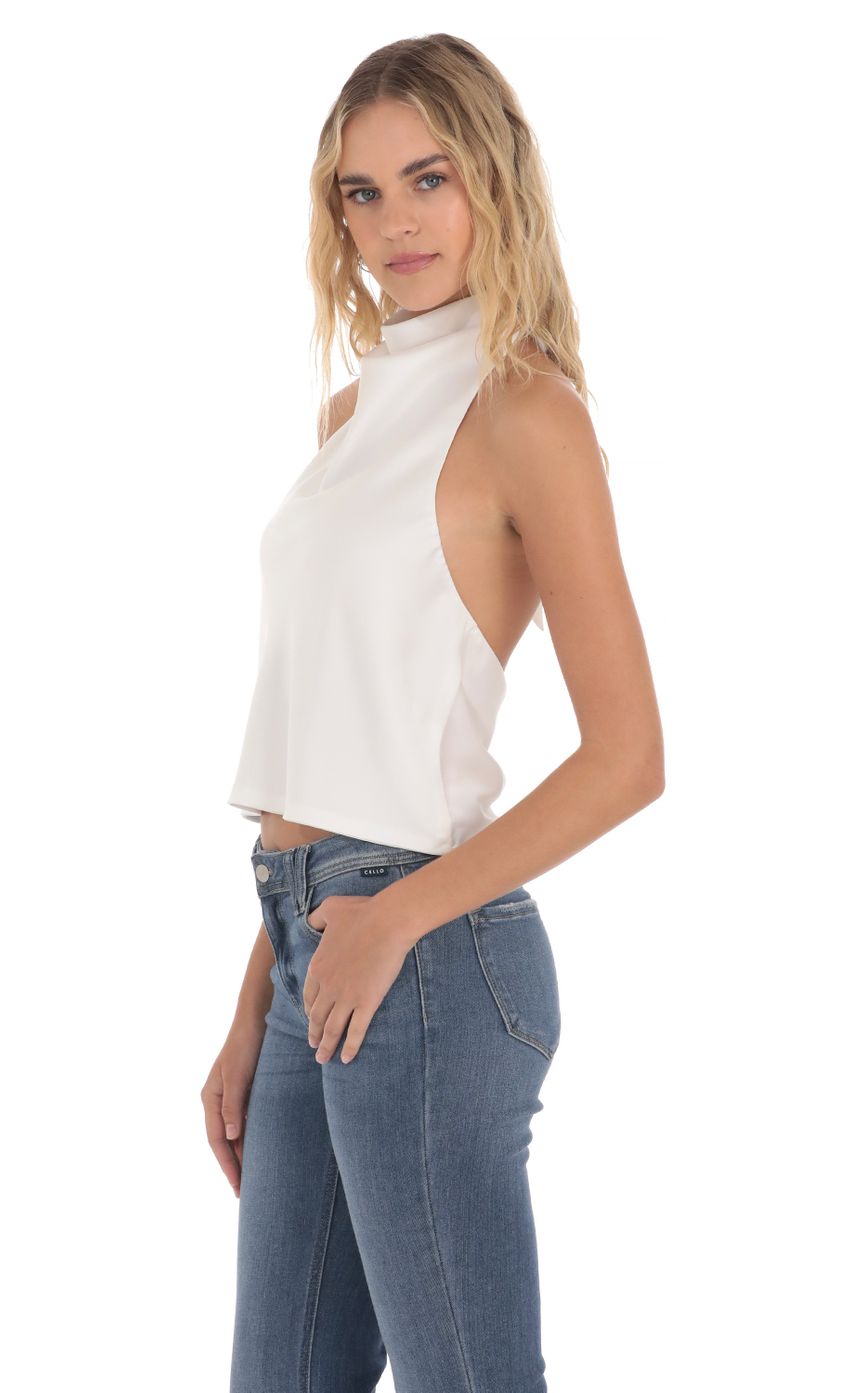 Picture Mock Neck Satin Top in White. Source: https://media-img.lucyinthesky.com/data/Apr24/850xAUTO/ca5f9686-a6c8-44a4-919a-a97ce6cbe57c.jpg