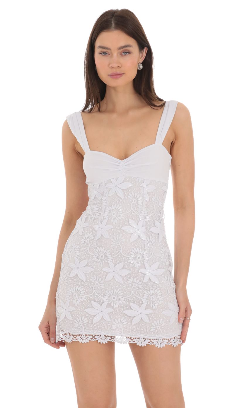 Picture Embroidered Floral Sequin Dress in White. Source: https://media-img.lucyinthesky.com/data/Apr24/850xAUTO/d1c7ff52-25cb-48b4-95c9-7bdd0e6f92b9.jpg