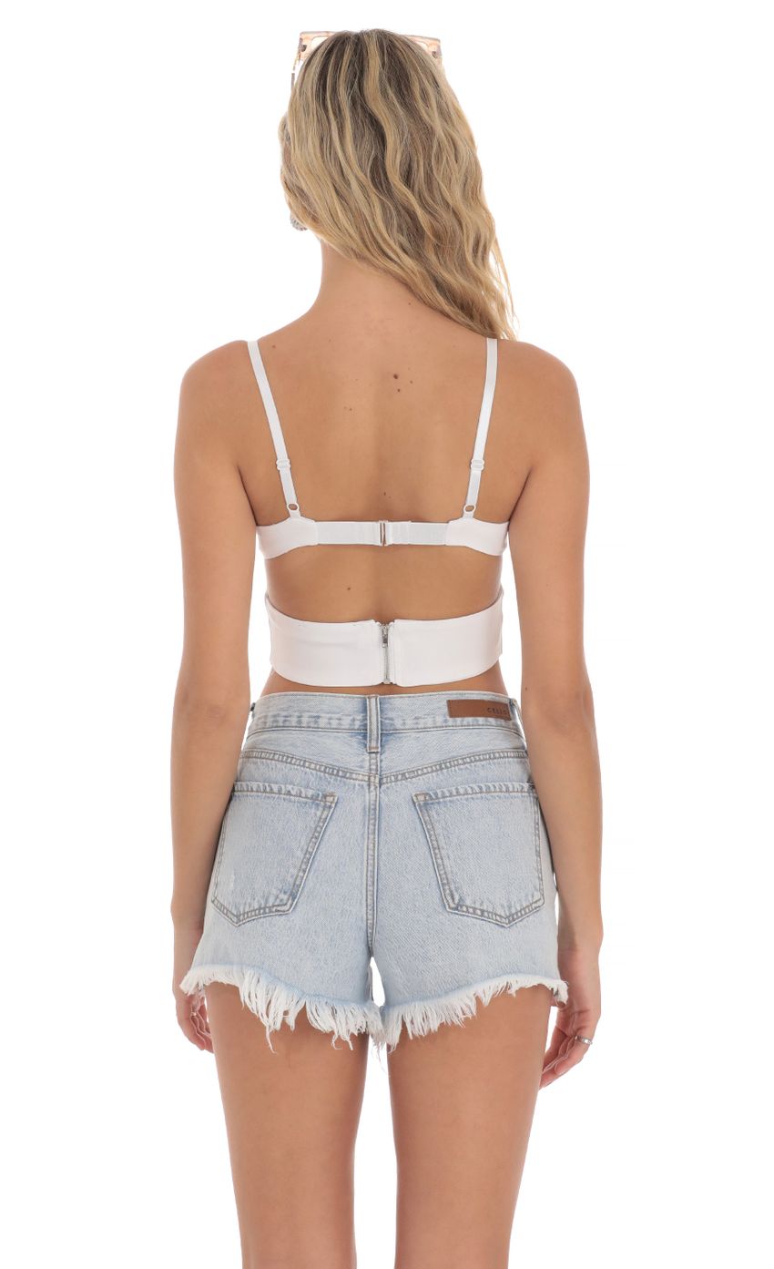 Picture Cutout Top in White. Source: https://media-img.lucyinthesky.com/data/Apr24/850xAUTO/d1fefa05-115a-4241-8522-e26e1058c2db.jpg