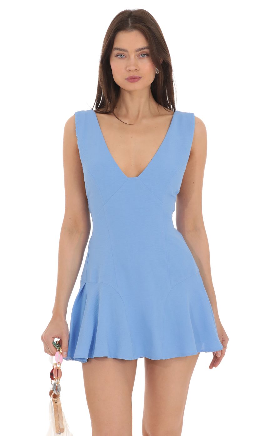 Picture V-Neck Fit and Flare Dress in Blue. Source: https://media-img.lucyinthesky.com/data/Apr24/850xAUTO/dd996134-6769-4dc1-b1ed-221e7096d936.jpg
