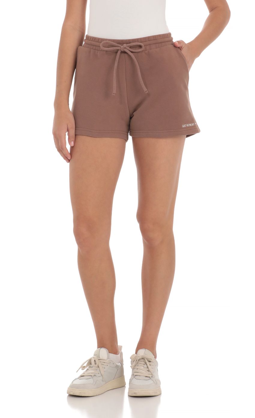 Picture Lucy in the Sky Sweat Shorts in Brown. Source: https://media-img.lucyinthesky.com/data/Apr24/850xAUTO/e4ac1c2f-a8d8-435f-aacf-584a91033d66.jpg