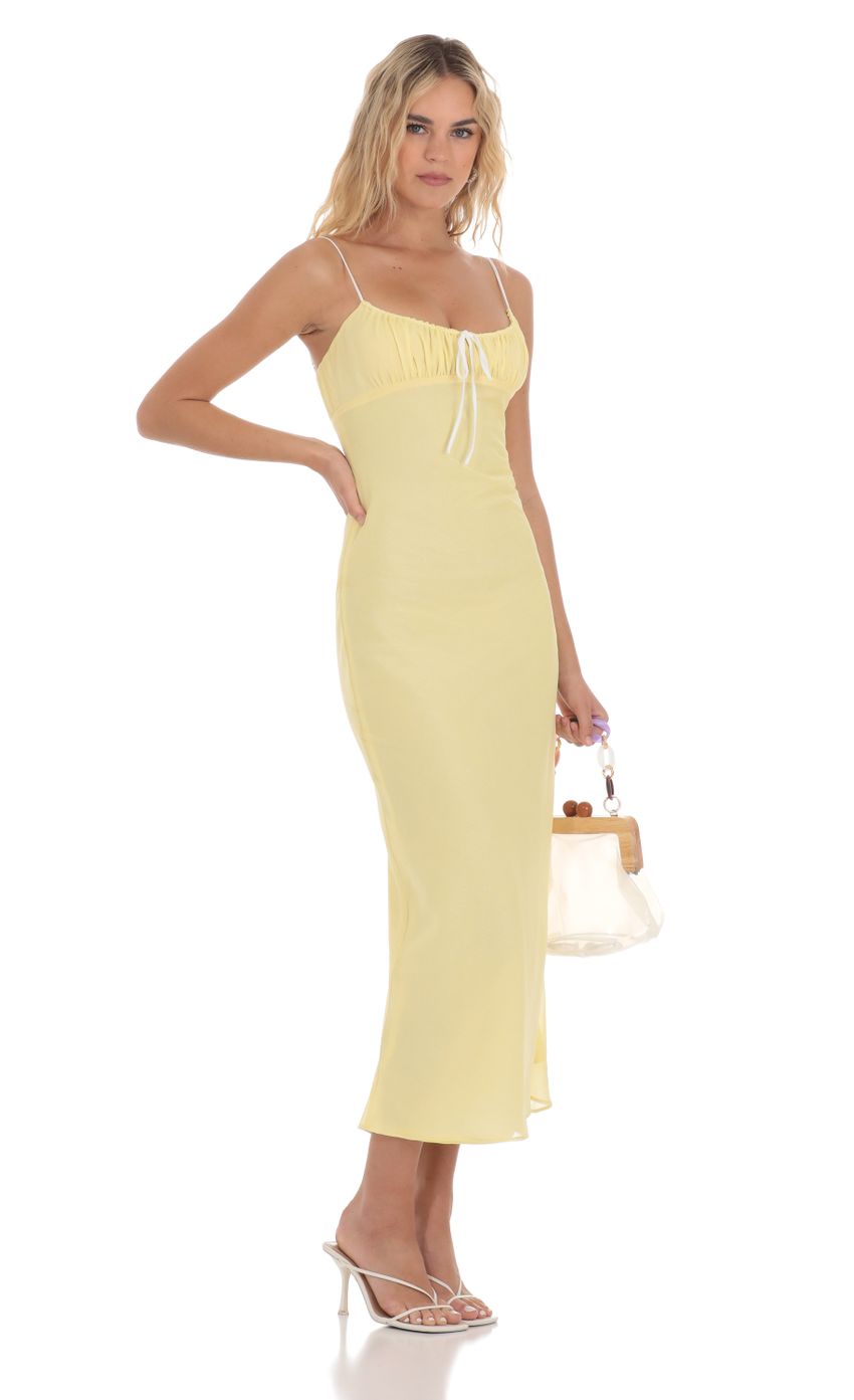 Picture Shimmer Ruched Bust Midi Dress in Yellow. Source: https://media-img.lucyinthesky.com/data/Apr24/850xAUTO/e5d4268a-f0a4-4526-b535-e08f497d0f3a.jpg