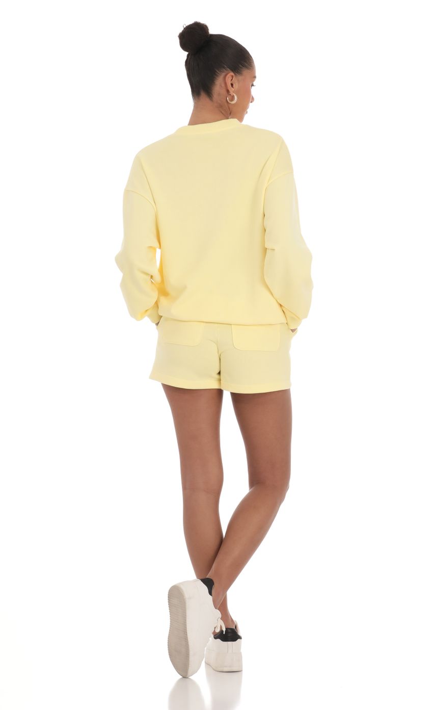 Picture Sweat Shorts in Yellow. Source: https://media-img.lucyinthesky.com/data/Apr24/850xAUTO/e6d85d66-a1fd-41d8-babe-9b68992ca072.jpg