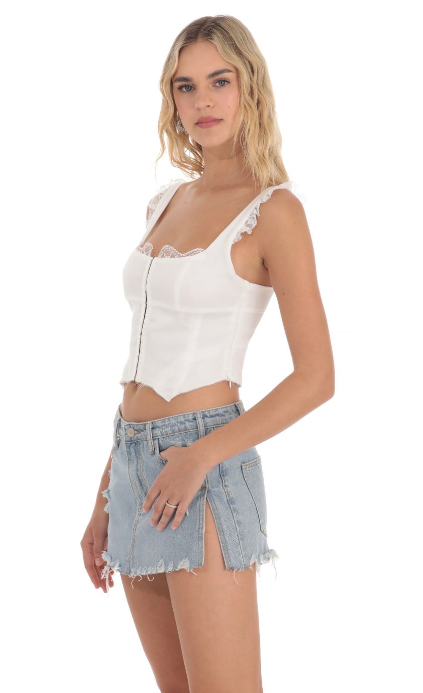 Picture Lace Trim Top in White. Source: https://media-img.lucyinthesky.com/data/Apr24/850xAUTO/f6c39c67-e3c1-4635-a37c-f1f3644f99a0.jpg