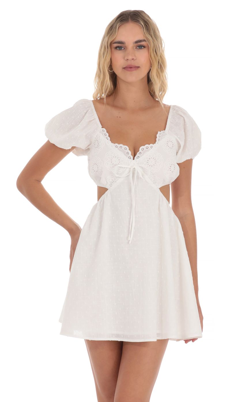 Picture Puff Sleeve Cutout Dress in White. Source: https://media-img.lucyinthesky.com/data/Apr24/850xAUTO/ff8ab30b-a784-476d-a10b-2e453b25197a.jpg