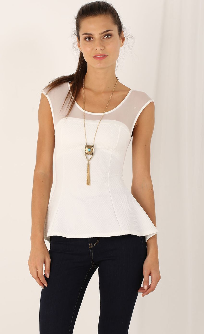 Picture Sleeveless Peplum Top. Source: https://media-img.lucyinthesky.com/data/Aug15_1/850xAUTO/0Y5A0092.JPG