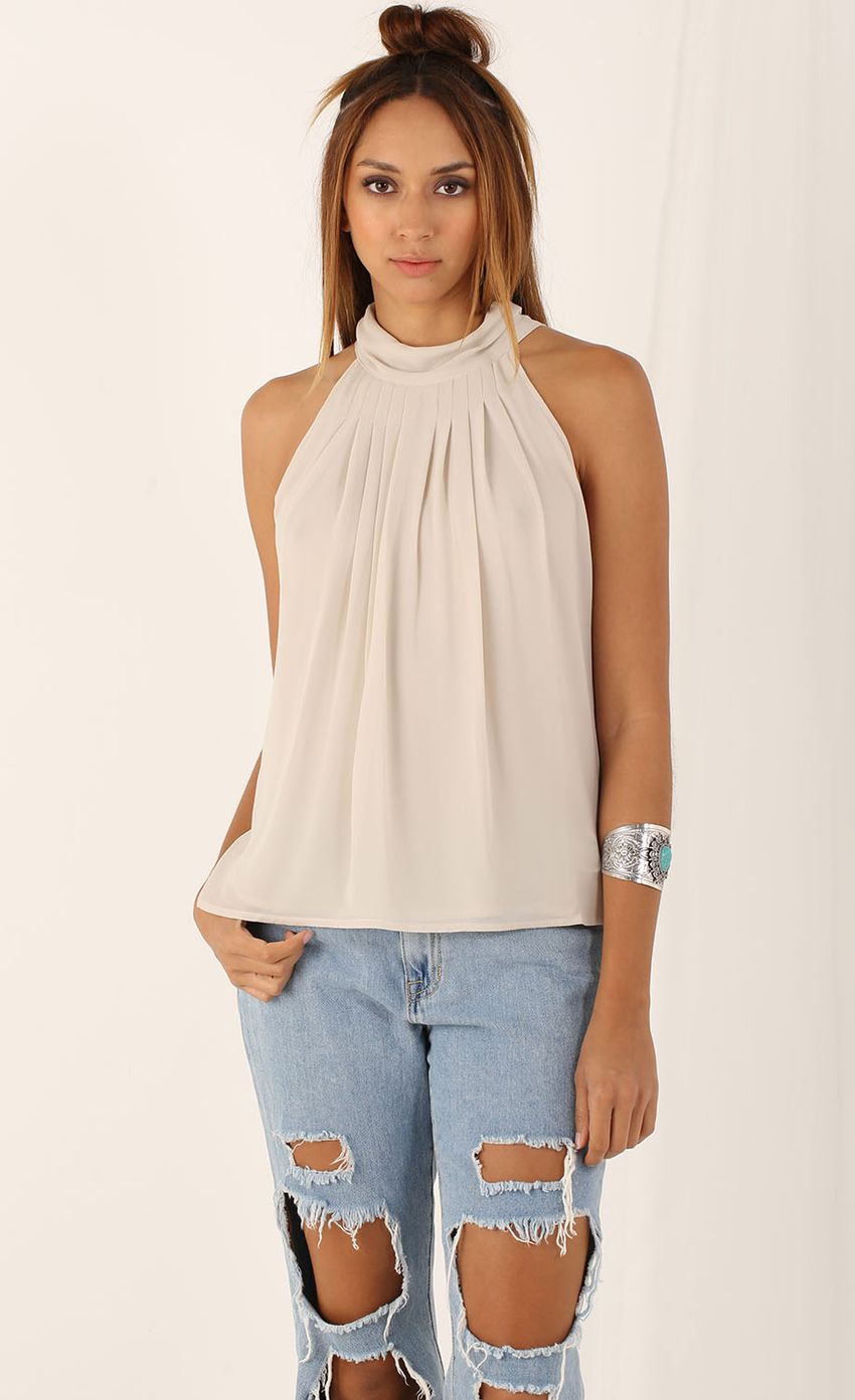 Picture Sleeveless Gathered Top in Beige. Source: https://media-img.lucyinthesky.com/data/Aug15_1/850xAUTO/0Y5A8961.JPG