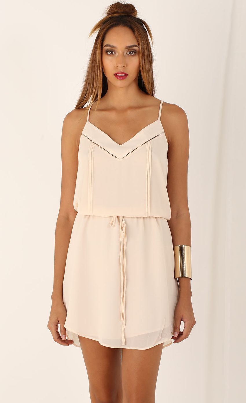 Picture Lined Blouson Dress in Cream. Source: https://media-img.lucyinthesky.com/data/Aug15_2/850xAUTO/0Y5A5159.JPG