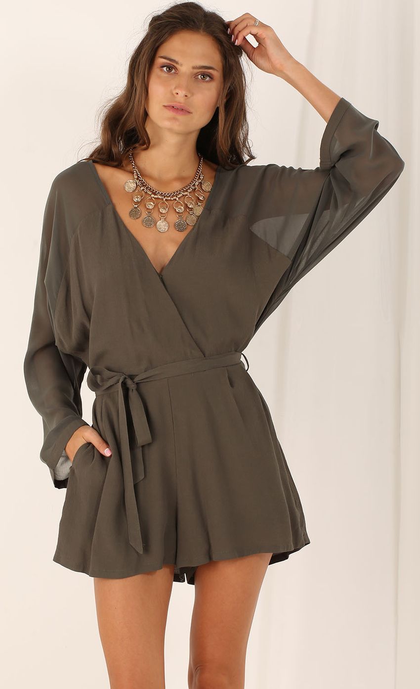 Picture Long Sleeve Wide Wrap Playsuit in Olive. Source: https://media-img.lucyinthesky.com/data/Aug15_2/850xAUTO/0Y5A5490.JPG