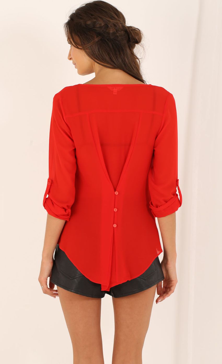 Picture Double Buttoned Blouse in Red. Source: https://media-img.lucyinthesky.com/data/Aug15_2/850xAUTO/0Y5A6921.JPG
