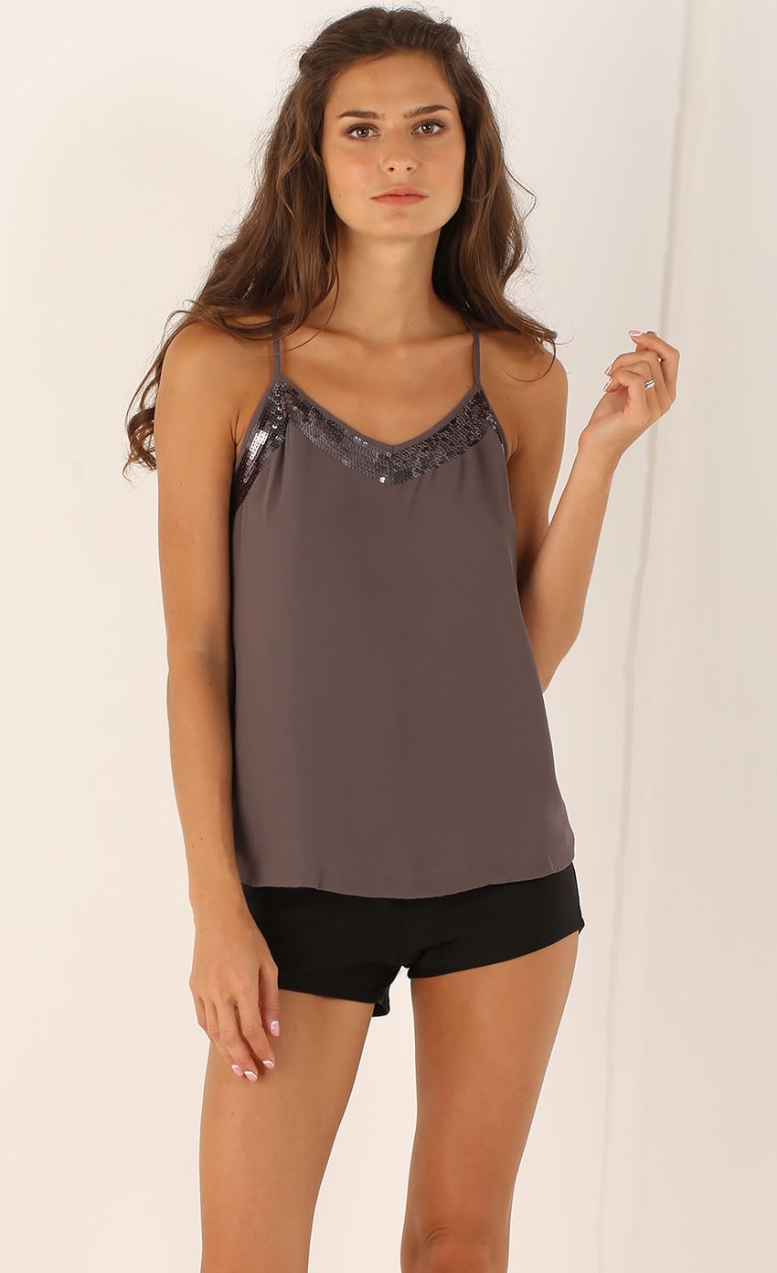 Picture Tank Top in Taupe with Metallic Accent. Source: https://media-img.lucyinthesky.com/data/Aug15_2/850xAUTO/0Y5A7221.JPG