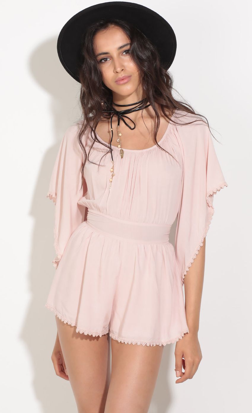 Picture Open Back Romper In Light Pink. Source: https://media-img.lucyinthesky.com/data/Aug16_1/850xAUTO/0Y5A4450.JPG