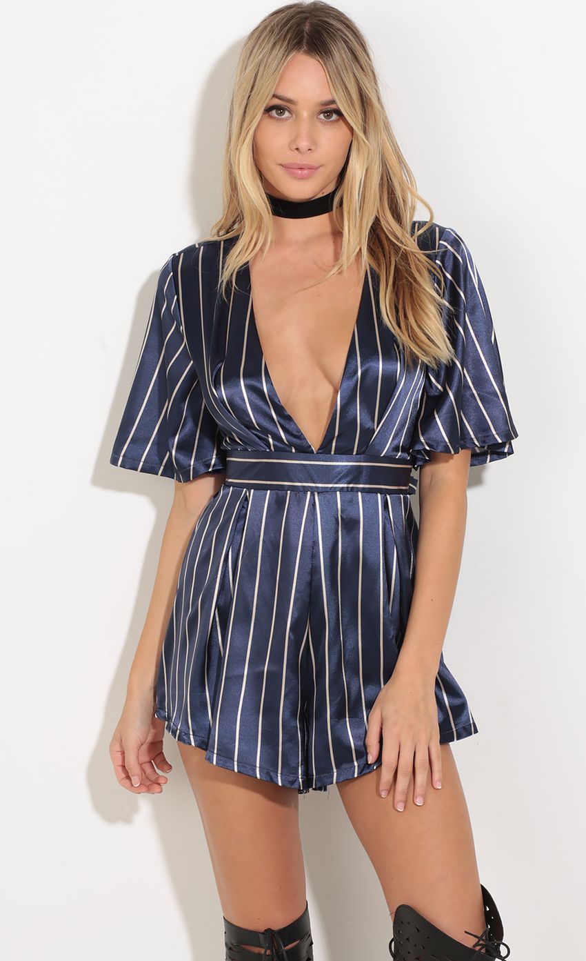 Picture Satin Stripped Plunge Romper In Indigo. Source: https://media-img.lucyinthesky.com/data/Aug16_2/850xAUTO/0Y5A9824.JPG